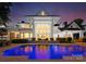 Luxurious backyard with a pool, outdoor seating, and stunning architecture, perfect for entertaining at 124 Wellcraft Ct, Mooresville, NC 28117