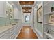 Bright hallway with a marble countertop, custom cabinetry, and a window seat offering water views at 124 Wellcraft Ct, Mooresville, NC 28117