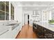 Elegant kitchen featuring custom cabinets, stainless steel appliances, and a central island at 124 Wellcraft Ct, Mooresville, NC 28117