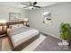 Nicely staged primary bedroom with a large bed, side tables, and natural lighting at 125 Newport Dr, Salisbury, NC 28144