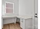 Bright office area with custom built-in desk and storage at 1279 Kindness Nw Ct, Concord, NC 28027