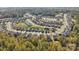 A captivating aerial view of a community featuring well-maintained homes surrounded by mature trees at 143 Glenn Dr, Mooresville, NC 28115