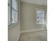 Neutral toned bedroom with white trim around the windows and baseboards at 1538 Riverwalk Pkwy, Rock Hill, SC 29730