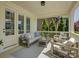 Cozy covered patio with comfortable seating, perfect for enjoying the outdoors with friends and Gathering at 1538 Riverwalk Pkwy, Rock Hill, SC 29730