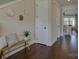 Bright foyer with hardwood floors, staircase, and stylish decor, creating a welcoming entrance at 1538 Riverwalk Pkwy, Rock Hill, SC 29730
