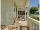 Relaxing front porch with comfortable seating and charming decor, perfect for enjoying the outdoors at 1538 Riverwalk Pkwy, Rock Hill, SC 29730