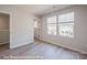 Well-lit room with gray floors featuring two large windows offering great natural light at 162 S Sycamore St, Mooresville, NC 28115
