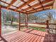 Covered back porch with comfortable seating, ideal for enjoying the outdoors at 2100 Lincolnton Hwy, Cherryville, NC 28021