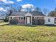 Charming brick home featuring a new roof, well-maintained landscaping, and a welcoming front entrance at 2100 Lincolnton Hwy, Cherryville, NC 28021