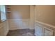 Well-lit room featuring paneled walls and beautiful herringbone floors at 2100 Lincolnton Hwy, Cherryville, NC 28021