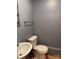 Powder room with a white toilet and vanity at 2137 Old Latter Rd, Newton, NC 28658