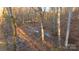 Natural creek amidst a forest of trees, adding to the property's beauty and recreational opportunities at 2137 Old Latter Rd, Newton, NC 28658
