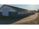 Large barn exterior with a green roof and siding, offering ample space and functionality for various purposes at 2137 Old Latter Rd, Newton, NC 28658
