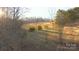 Hilly land with trees, showcasing the natural beauty and potential for outdoor adventures at 2137 Old Latter Rd, Newton, NC 28658