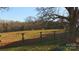 Expansive pasture with grazing horses, offering serene country living and ample space for animals at 2137 Old Latter Rd, Newton, NC 28658