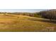 A large, fenced pasture with grazing horses; ideal for livestock and enjoying the countryside at 2137 Old Latter Rd, Newton, NC 28658