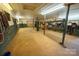 Tack room interior with ample storage, providing organization and convenience for equestrian equipment and supplies at 2137 Old Latter Rd, Newton, NC 28658
