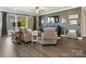 Cozy living room with comfortable seating, a TV, and natural light at 2894 Westshore Pl, Denver, NC 28037
