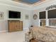 Spacious primary bedroom featuring neutral carpet, a wooden dresser, and window views at 2894 Westshore Pl, Denver, NC 28037