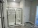 Elegant bathroom features a modern glass enclosed shower with subway tile and a built-in seat at 2924 Noritake Trl # 59, Albemarle, NC 28001