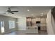 Open-concept kitchen featuring stainless steel appliances and a central island at 2924 Noritake Trl # 59, Albemarle, NC 28001