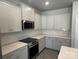 Modern kitchen with stainless steel appliances, white cabinets, and subway tile backsplash at 2924 Noritake Trl # 59, Albemarle, NC 28001