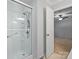 Bright bathroom with a shower and glass doors, as seen from the doorway at 3142 Wimbledon Ln, Rock Hill, SC 29732