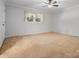 Spacious bedroom with a ceiling fan and a large window providing natural light at 3142 Wimbledon Ln, Rock Hill, SC 29732