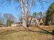 Brick home with mature trees, offering shade and character to the landscape at 3142 Wimbledon Ln, Rock Hill, SC 29732
