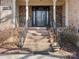 Inviting front entrance with brick steps, stone accents, and a glass front door at 3142 Wimbledon Ln, Rock Hill, SC 29732