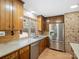 Well-lit kitchen featuring wood cabinets, stainless steel appliances, and a window overlooking the outdoors at 3142 Wimbledon Ln, Rock Hill, SC 29732