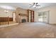 Cozy living room with a brick fireplace and a sliding glass door at 3142 Wimbledon Ln, Rock Hill, SC 29732