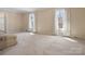 Bright living room with large windows and neutral wall colors at 3142 Wimbledon Ln, Rock Hill, SC 29732