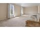 Spacious living room with large windows and neutral carpeting at 3142 Wimbledon Ln, Rock Hill, SC 29732