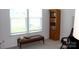 Office features a bookcase, a bench and natural light at 3309 Juneberry Pl, Indian Land, SC 29707