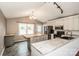 Bright, modern kitchen features white cabinets, butcher block island, and stainless steel appliances at 342 Monticello Rd, Statesville, NC 28625