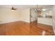 Bright living room featuring hardwood floors, a ceiling fan, and an open layout at 349 Valley Brook Se Ln, Concord, NC 28025