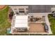 Aerial view of fenced backyard with patio, pergola, and grill, perfect for outdoor entertaining at 4022 Carl Parmer Dr, Harrisburg, NC 28075