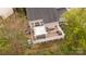 Aerial view of fenced backyard with patio, pergola, and outdoor seating, creating a private retreat at 4022 Carl Parmer Dr, Harrisburg, NC 28075