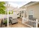 Backyard patio with pergola and wicker furniture, a cozy spot for outdoor relaxation and socializing at 4022 Carl Parmer Dr, Harrisburg, NC 28075