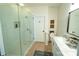 Modern bathroom featuring a large glass shower, mosaic tile, and updated vanity with marble countertop at 4022 Carl Parmer Dr, Harrisburg, NC 28075