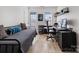 Bedroom with desk and shelving, offering a functional workspace and bed for versatile use at 4022 Carl Parmer Dr, Harrisburg, NC 28075