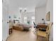 Bedroom featuring neutral walls, natural light, a bed, a desk, and wood flooring at 4022 Carl Parmer Dr, Harrisburg, NC 28075
