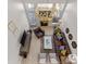 An aerial view showcasing an open living room with fireplace, neutral furniture, and natural light at 4022 Carl Parmer Dr, Harrisburg, NC 28075