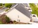 Aerial view of rear exterior featuring manicured backyard with patio and pergola, enhancing outdoor living at 4022 Carl Parmer Dr, Harrisburg, NC 28075