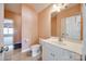 Well-lit bathroom featuring a white vanity and ample counter space at 4103 Belle Meade Cir, Belmont, NC 28012