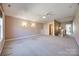 Large bonus room with carpeted floors, a ceiling fan, and multiple entryways at 4103 Belle Meade Cir, Belmont, NC 28012