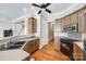 Well-equipped kitchen with stainless steel appliances, wooden cabinets, and hardwood floors at 4103 Belle Meade Cir, Belmont, NC 28012