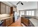 Charming kitchen featuring wooden cabinets, stainless steel appliances, and an adjacent breakfast area at 4103 Belle Meade Cir, Belmont, NC 28012