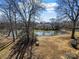 This backyard features a pond and beautiful view of the neighborhood at 4824 Spring Lake Dr # E, Charlotte, NC 28212